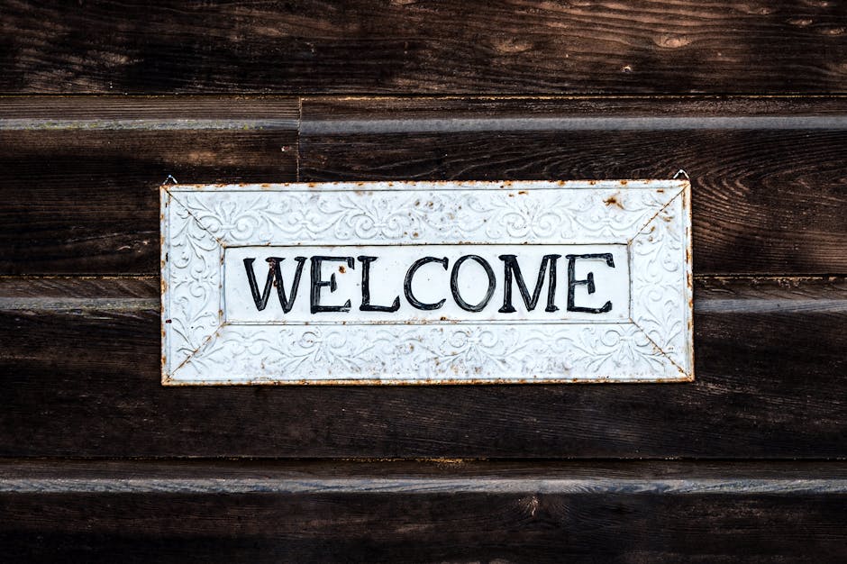 pexels-photo-3643925-3643925 A rustic vintage-style 'Welcome' sign on a wooden wall creating a warm and inviting atmosphere.